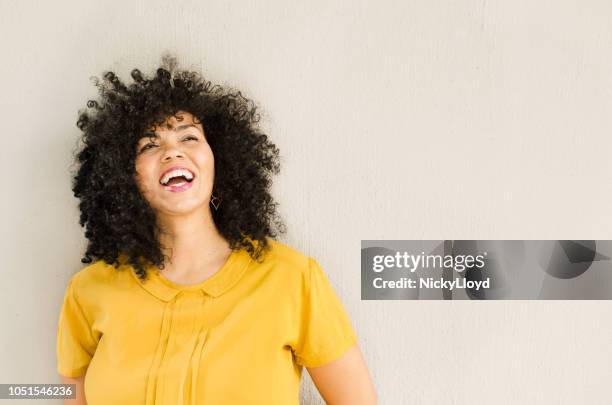 beautiful mixed race woman smiling - one woman only 35-40 stock pictures, royalty-free photos & images