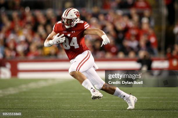 Jake Ferguson of the Wisconsin Badgers runs with the ball in the first quarter against the Nebraska Cornhuskers at Camp Randall Stadium on October 6,...