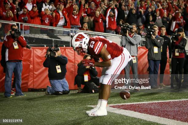 Jonathan Taylor of the Wisconsin Badgers celebrates after scoring a touchdown in the third quarter against the Nebraska Cornhuskers at Camp Randall...