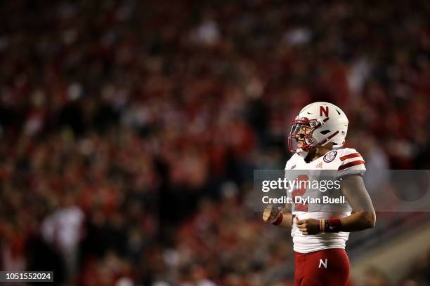 Adrian Martinez of the Nebraska Cornhuskers jogs onto the field in the third quarter against the Wisconsin Badgers at Camp Randall Stadium on October...