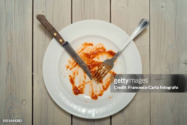 leftovers - dirty plate stock pictures, royalty-free photos & images