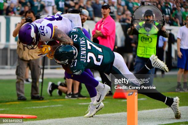 Malcolm Jenkins of the Philadelphia Eagles tackles Kyle Rudolph of the Minnesota Vikings during the fourth quarter at Lincoln Financial Field on...