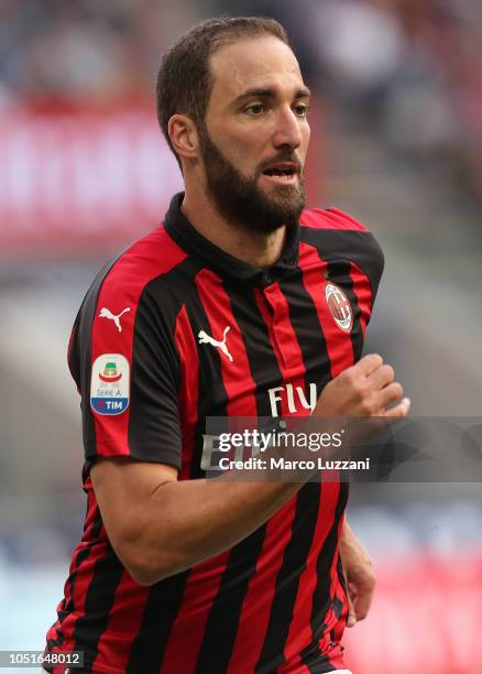 Gonzalo Higuain of AC Milan in action during the Serie A match between AC Milan and Chievo Verona at Stadio Giuseppe Meazza on October 7, 2018 in...