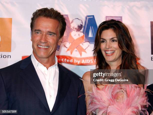 Arnold Schwarzenegger and Cindy Crawford during 10th Anniversary Dream Halloween Los Angeles Fundraising Event at Barker Hanger in Santa Monica,...