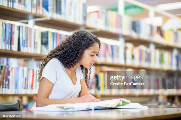 girl preparing for a test - teenagers reading books stock pictures, royalty-free photos & images