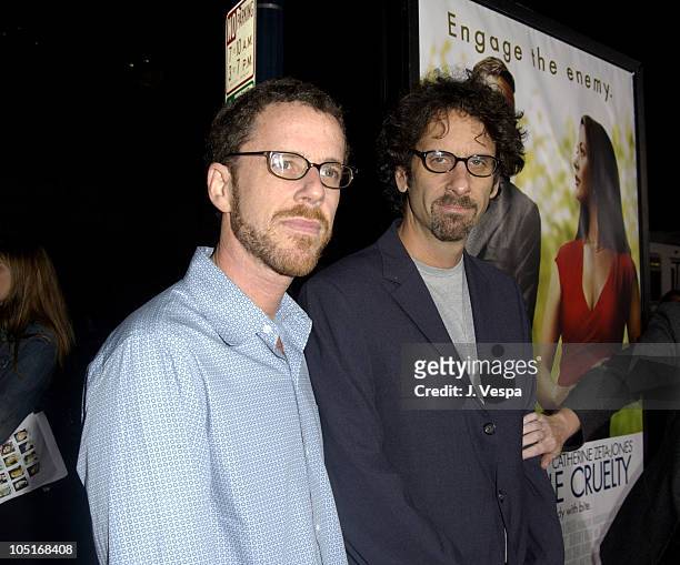 Ethan Coen and Joel Coen during "Intolerable Cruelty" Premiere - Red Carpet at Academy Theater in Los Angeles, California, United States.