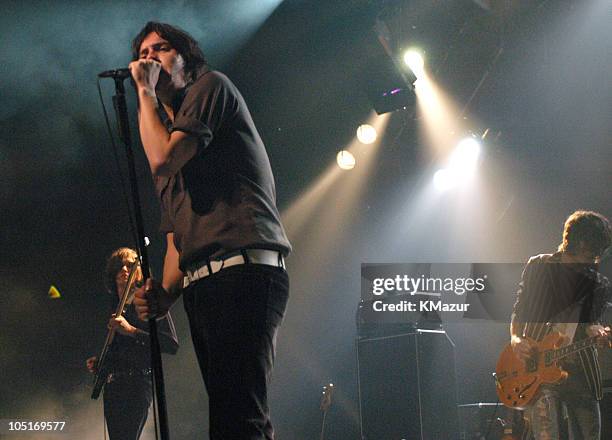 Nikolai Fraiture, Julian Casablancas and Nick Valensi of The Strokes