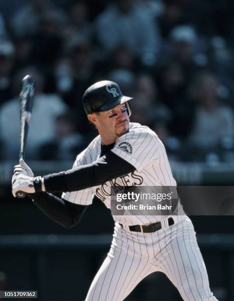 Mike Lansing, Second Baseman, Shortstop and Third Baseman for the Colorado Rockies batting against the Atlanta Braves during their Major League...