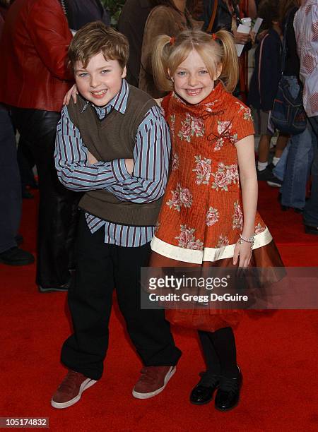 Spencer Breslin and Dakota Fanning during "The Cat In The Hat" World Premiere at Universal Studios Cinema in Universal City, California, United...