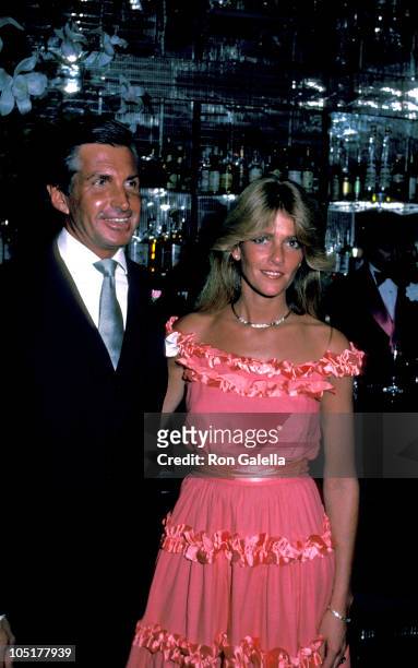 George Hamilton and Liz Treadwell during Regine's 7th Anniversary Party at Regine's in New York City, New York, United States.