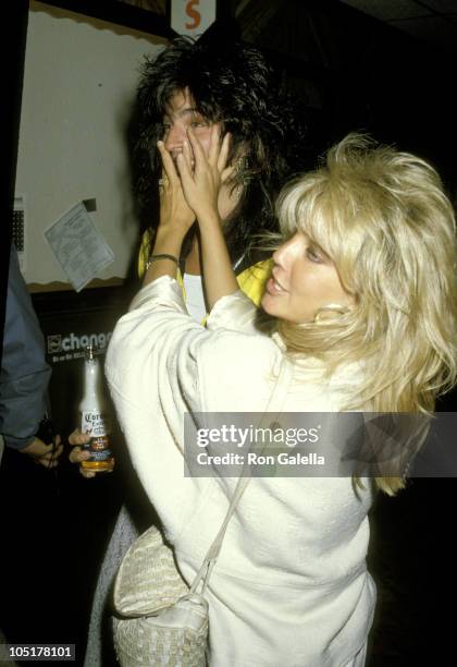 Tommy Lee and Heather Locklear during 4th Annual Rock & Bowl Tournament For The T.J. Martel Foundation at Calabasas Country Club in Calabasas,...