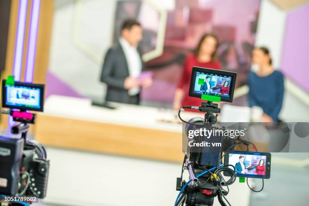 cameras filming a television talk show - stage set stock pictures, royalty-free photos & images