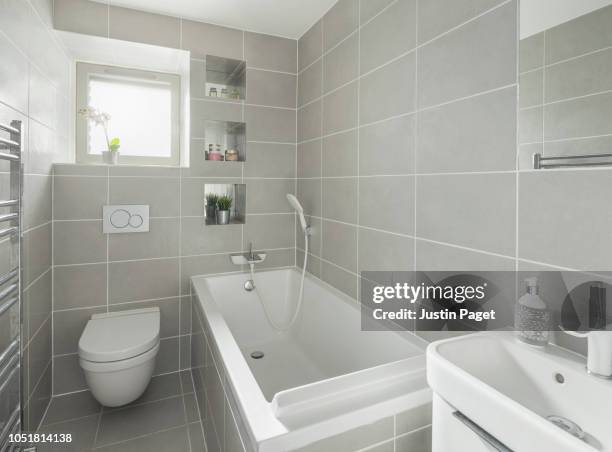 contemporary bathroom - new bathtub stock pictures, royalty-free photos & images