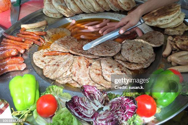 display of grilled meat, ready to sell. - lubiana foto e immagini stock