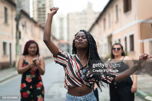 group of diverse friends dancing at street - street dancers stock pictures, royalty-free photos & images