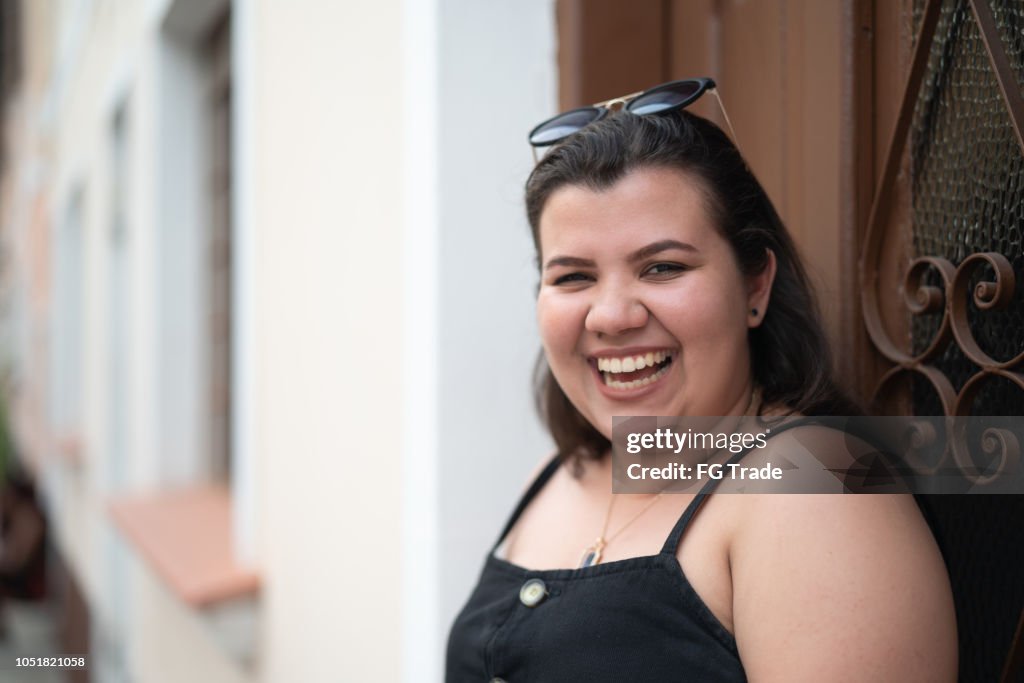 Cute Girl Portrait at in the Front of the House