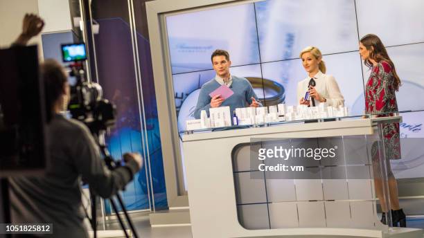 filming a tv infomercial about cosmetic products - television host stock pictures, royalty-free photos & images