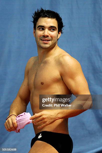 Alexandre Despatie of Canada celebrates after winning the gold medal in the Men's 3m Springboard Final at Dr. S.P. Mukherjee Aquatics Complex during...