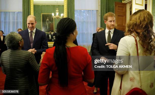 Britain's Prince William, Duke of Cambridge, and Britain's Prince Harry, Duke of Sussex, Kenya's First Lady Margaret Kenyatta , wife of President...