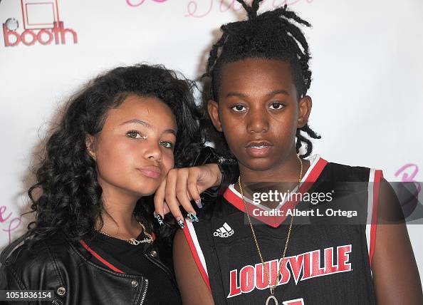 Que 9 Singer Brooklyn Queen poses with Que 9 at the Music Video Release Party For ...
