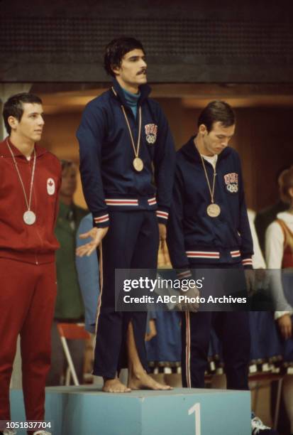 Munich, West Germany - August 31 1972: Bruce Robertson, Mark Spitz, Jerry Heidenreich in medal ceremony for Men's 100 metre butterfly tournament at...