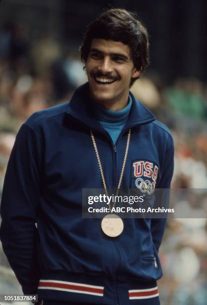 Munich, West Germany Mark Spitz wearing gold medal at the 1972 Summer Olympics / the Games of the XX Olympiad, Schwimmhalle.