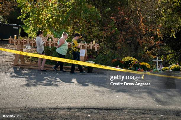 Mourners visit the site of a fatal limousine crash that killed 20 people near the intersection of Route 30 South and Route 30A, October 10, 2018 in...