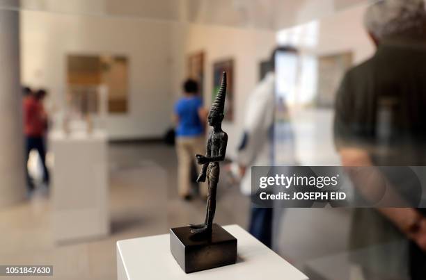 Statue of Phoenician deity Baal is seen on display at Nabu Museum, in Lebanon's el-Heri village, north of Beirut, on September 27, 2018. - The a new...