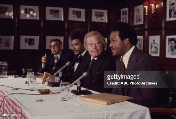Howard Cosell, Don King, Roone Arledge, George Forman at press conference.
