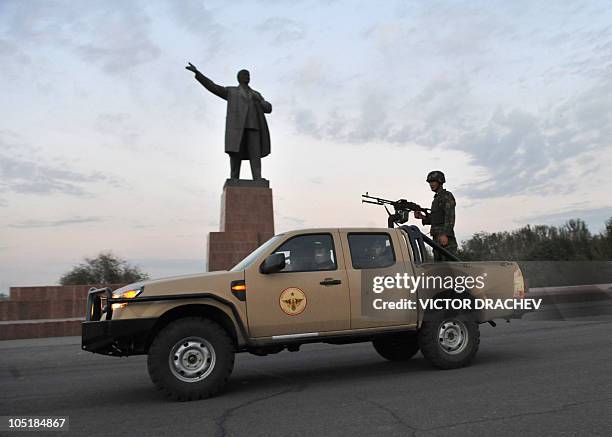Kyrgyz soldiers patrol near a monument dedicated to Lenin, in Osh on October 9, 2010. Kyrgyzstan's parties yesterday made a final push for votes in...