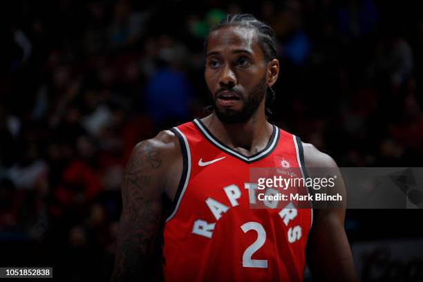 Kawhi Leonard of the Toronto Raptors looks on during a pre-season game against the Brooklyn Nets on October 10, 2018 at Bell Centre, in Montreal,...
