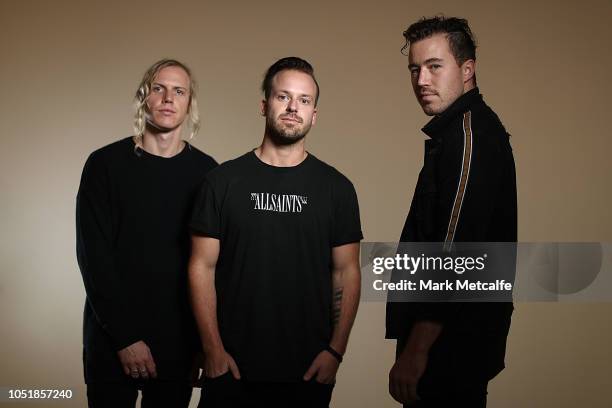 Tyrone Lindqvist, Jon George and James Hunt from the band Rufus Du Sol pose during the 32nd Annual ARIA Nominations Event at the Art Gallery of NSW...