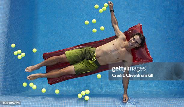 Tennis player Rafael Nadal poses for a portrait shoot in Majorca on July 29, 2010.