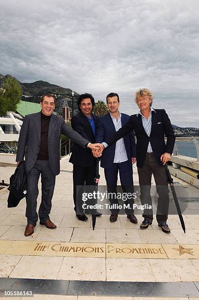 Antonio Caliendo, Hugo Sanchez, Carlos Dunga and Giancarlo Antognoni pose on The Champions Promenade before the Golden Foot Awards ceremony at...