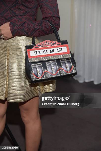 Actress Jearnest Corchado, purse detail, attends a screening of SyFy's "Cucuy: The Boogeyman" at ArcLight Sherman Oaks on October 10, 2018 in Sherman...