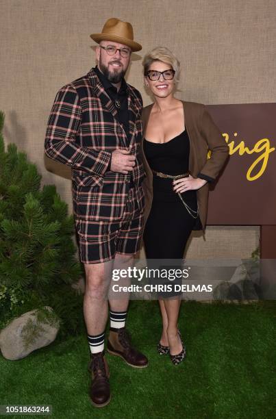 Actor Chris Sullivan and his wife Rachel Reichard arrive for the HBO series premiere of "Camping" on October 10, 2018 at the Paramount studios in Los...