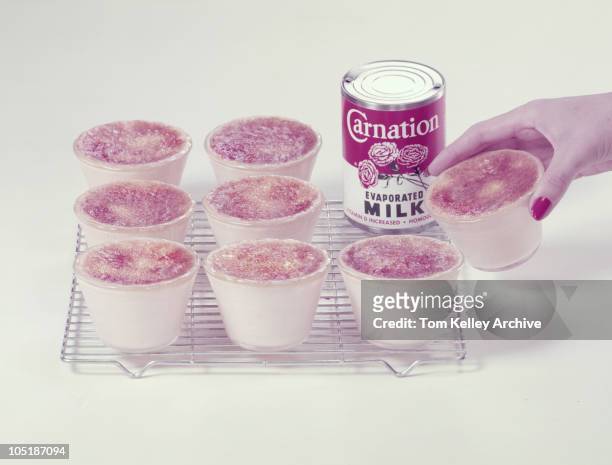 Tin of Carnation evaporated milk with custards, 1952.