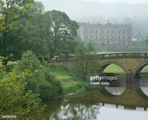 View across the River Derwent towards Chatsworth House, Chatsworth, Derbyshire, circa 1970. The stately home is the seat of the Duke of Devonshire.