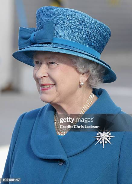 Queen Elizabeth II smiles as she arrives to name Cunard's new cruise-liner Queen Elizabeth II in Southampton Docks on October 11, 2010 in...