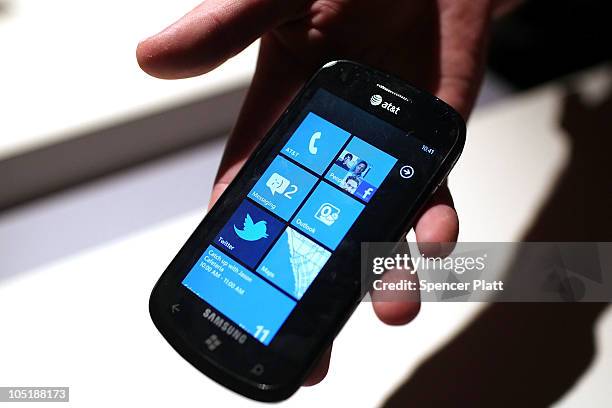 Person holds a new Windows Phone 7 mobile operating system on October 11, 2010 in New York, New York. The phone, which will be available in the...