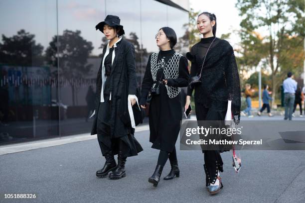 Guests are seen on the street during Shanghai Fashion Week on October 11, 2018 in Shanghai, China.