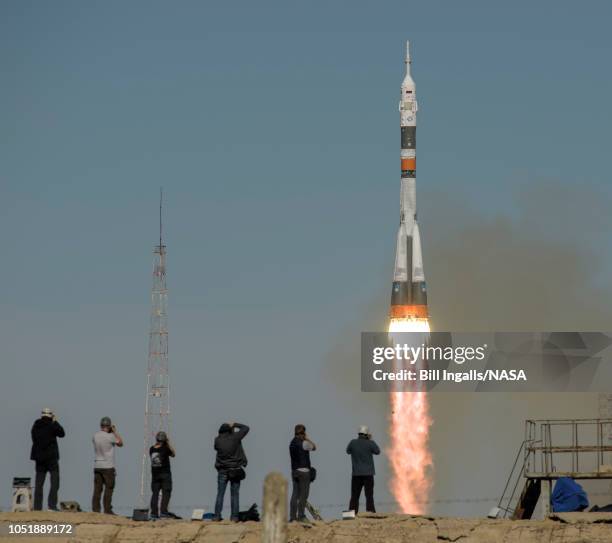 In this handout provided by NASA, the Soyuz MS-10 spacecraft is launched with Expedition 57 Flight Engineer Nick Hague of NASA and Flight Engineer...