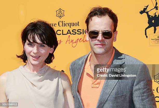Actress Michele Hicks and husband actor Jonny Lee Miller attend the 1st Annual Veuve Clicquot Polo Classic Los Angeles at Will Rogers State Historic...