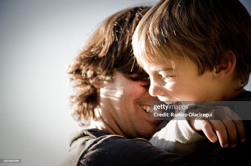 Kid and dad with sun rays