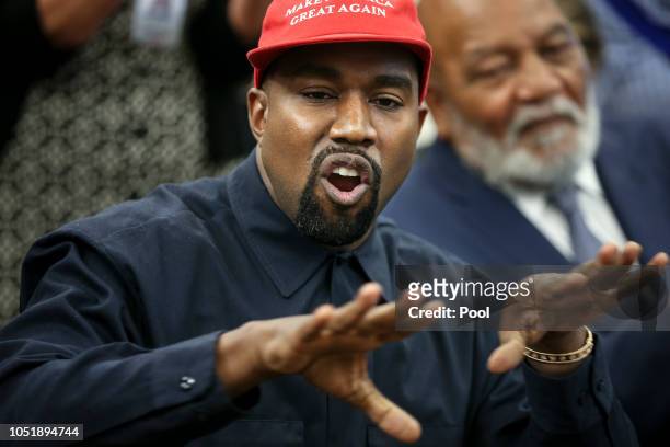 Rapper Kanye West speaks during a meeting with U.S. President Donald Trump in the Oval office of the White House on October 11, 2018 in Washington,...