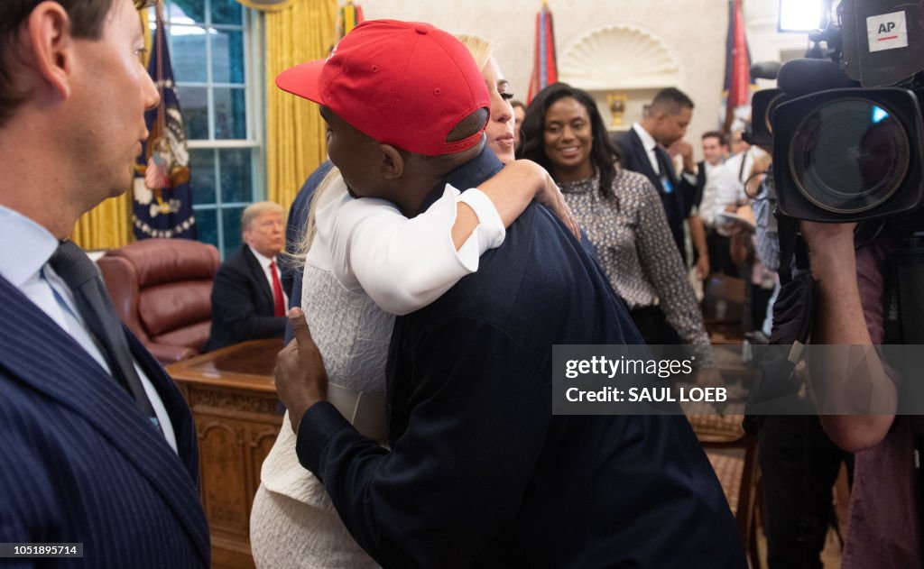 Ptsaiden Rapper Rapper Kanye West hugs Ivanka Trump after meeting with US President ...