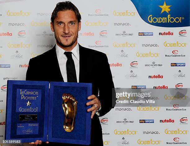 Francesco Totti receives the Golden Foot award during the Golden Foot Awards ceremony at Fairmont Hotel on October 11, 2010 in Monaco, Monaco.