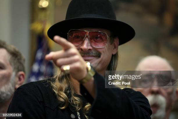 Kid Rock attends a signing ceremony as U.S. President Donald Trump signs the H.R. 1551, the 'Orrin G. Hatch-Bob Goodlatte Music Modernization Act' in...