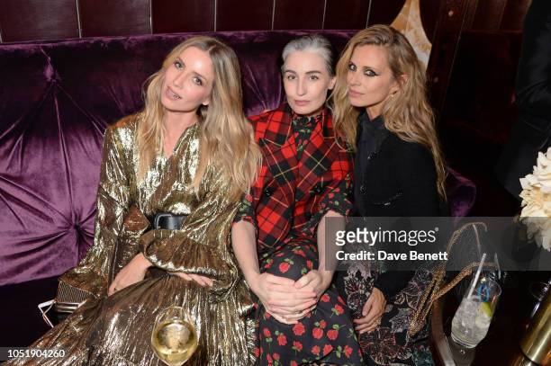 Annabelle Wallis, Erin O'Connor and Laura Bailey attend the Michael Kors cocktail party to celebrate the collaboration with David Downton at...