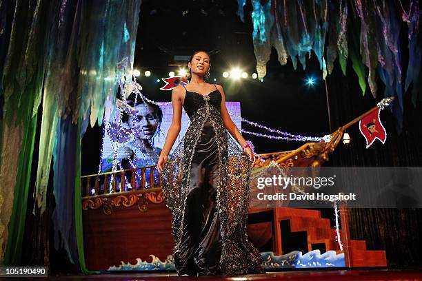 Contestant Pitchadapha Phasi enters the stage on the final night of Miss Tiffany's Universe May 15, 2009 in Pattaya, Thailand. Thirty contestants...